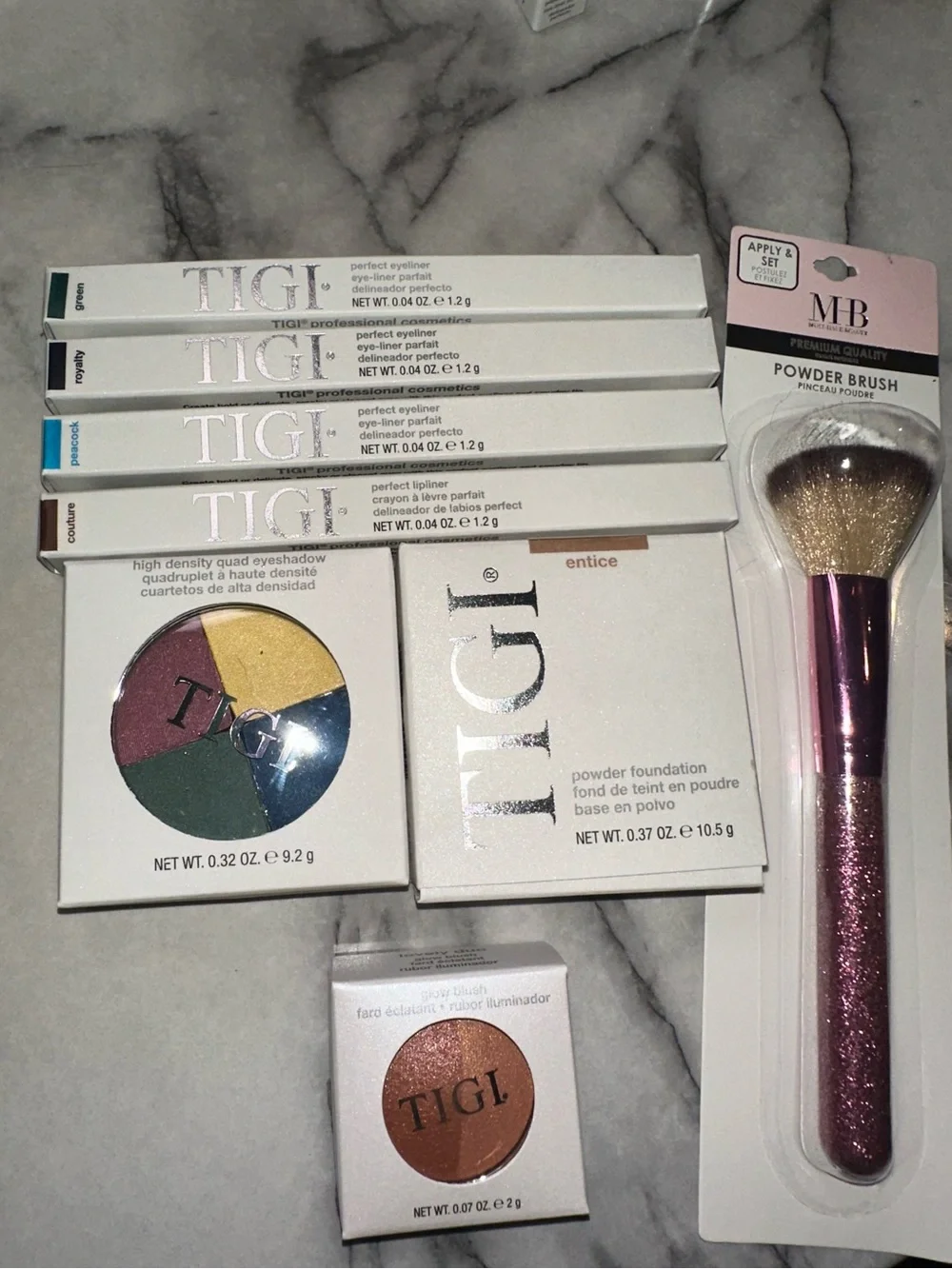 TIGI eyeshadow pallet,3 eyeliners,1 lipliner,glow blush, blush brush,foudation